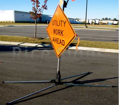 RU5000 sign stand shown with optional Utility Work Ahead roll-up sign.