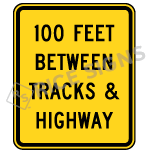 Custom Feet Between Tracks And Highway Sign